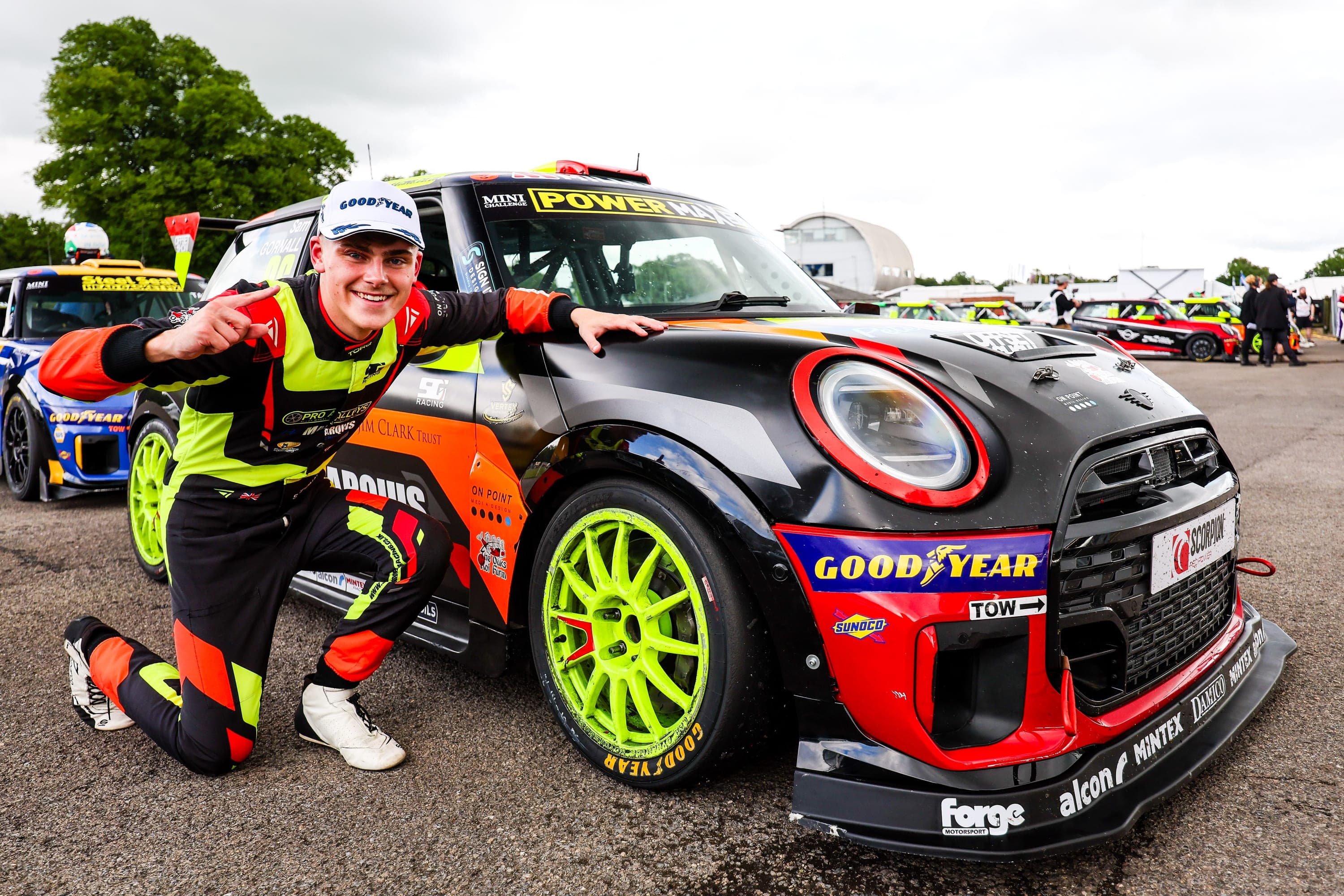 Sam Gornall collecting another win next crouched to his JCW Mini in his Racecraft